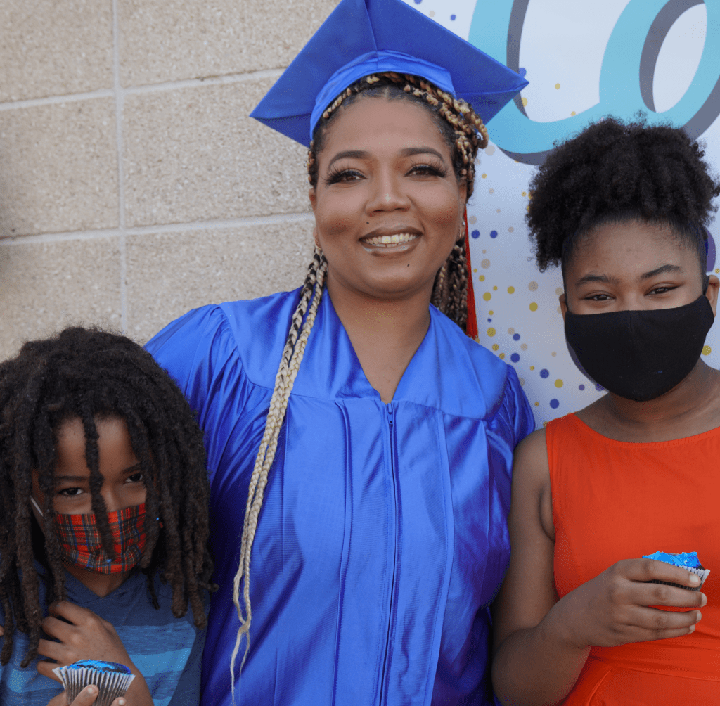 Grad and Family Career Online High School graduate with family memebers after graduation ceremony