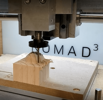 Nomad 3 CNC Mill carving a head from a block of wood
